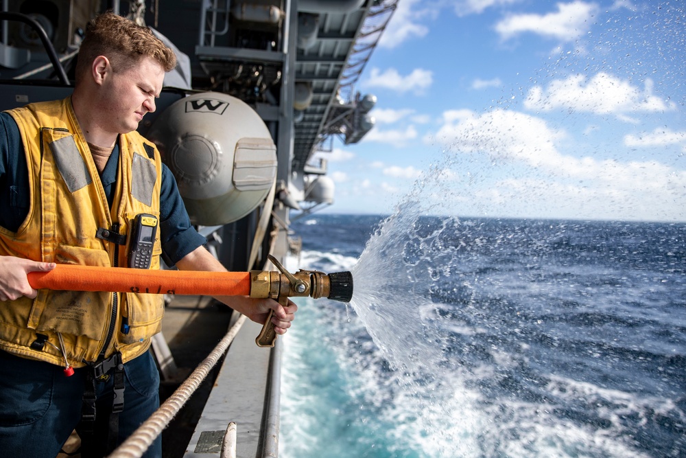 Sailors preform Maintinance onboard USS Tripoli