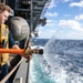 Sailors preform Maintinance onboard USS Tripoli