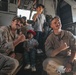 U.S. military personnel interact with spectators at the Bahrain International Airshow 2024