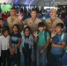 U.S. military personnel interact with spectators at the Bahrain International Airshow 2024