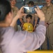 U.S. military personnel interact with spectators at the Bahrain International Airshow 2024