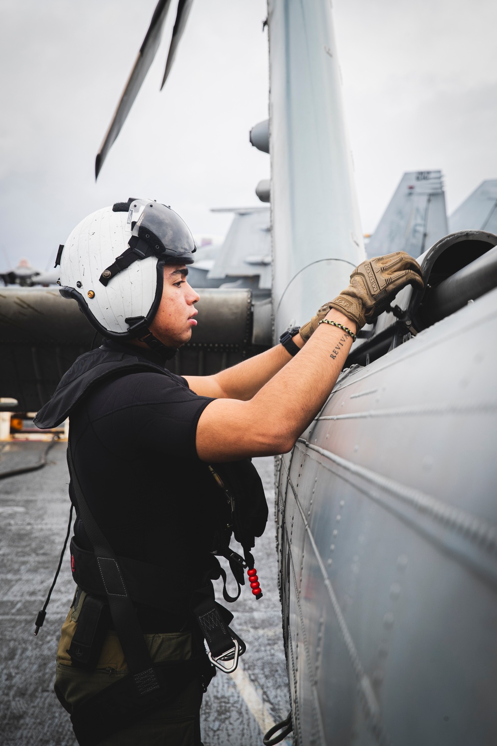 HSC-12 checks an MH-60S before take off