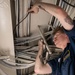 USS George Washington (CVN 73) install network cables