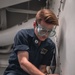 USS George Washington Sailors perform fan coil unit maintenance