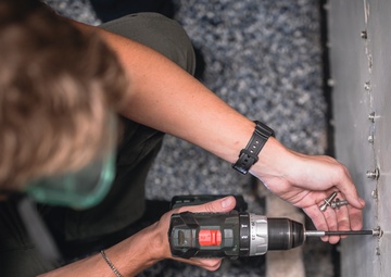 USS George Washington Sailors perform fan coil unit maintenance