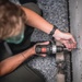 USS George Washington Sailors perform fan coil unit maintenance