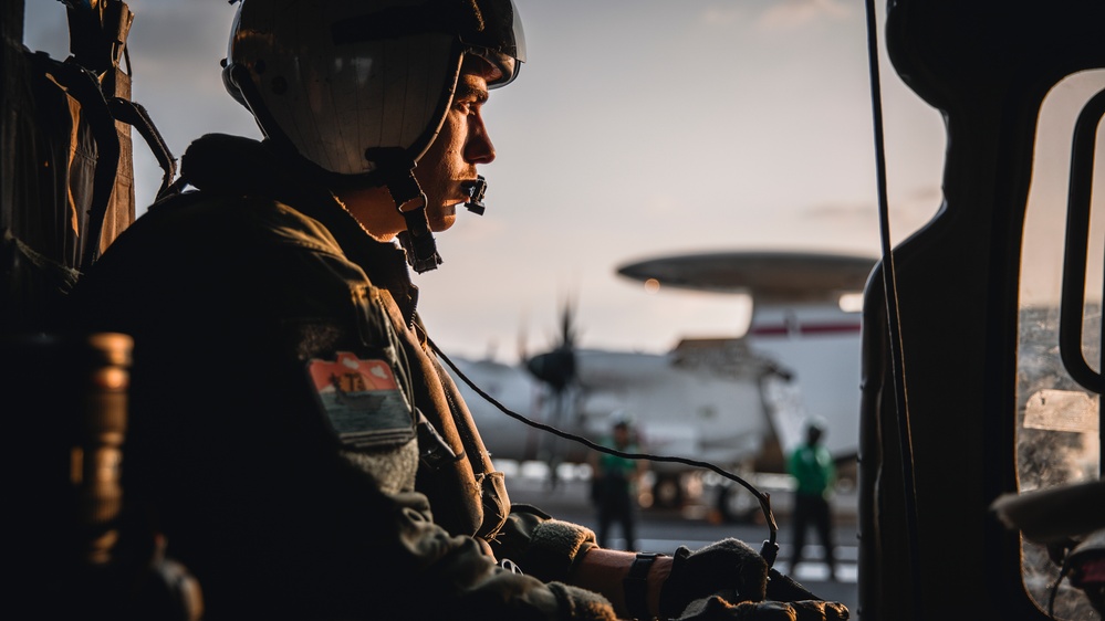 USS George Washington Sailor prepares to execute photo operation