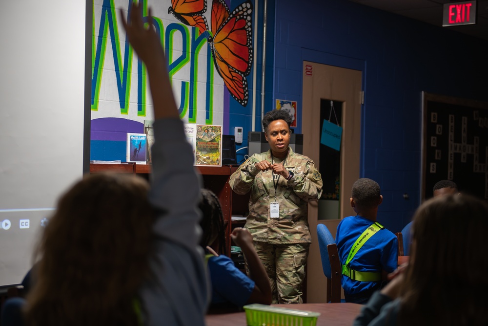 FLARNG Soldier Teaches Young Safety Patrol Students Flag Folding Traditions