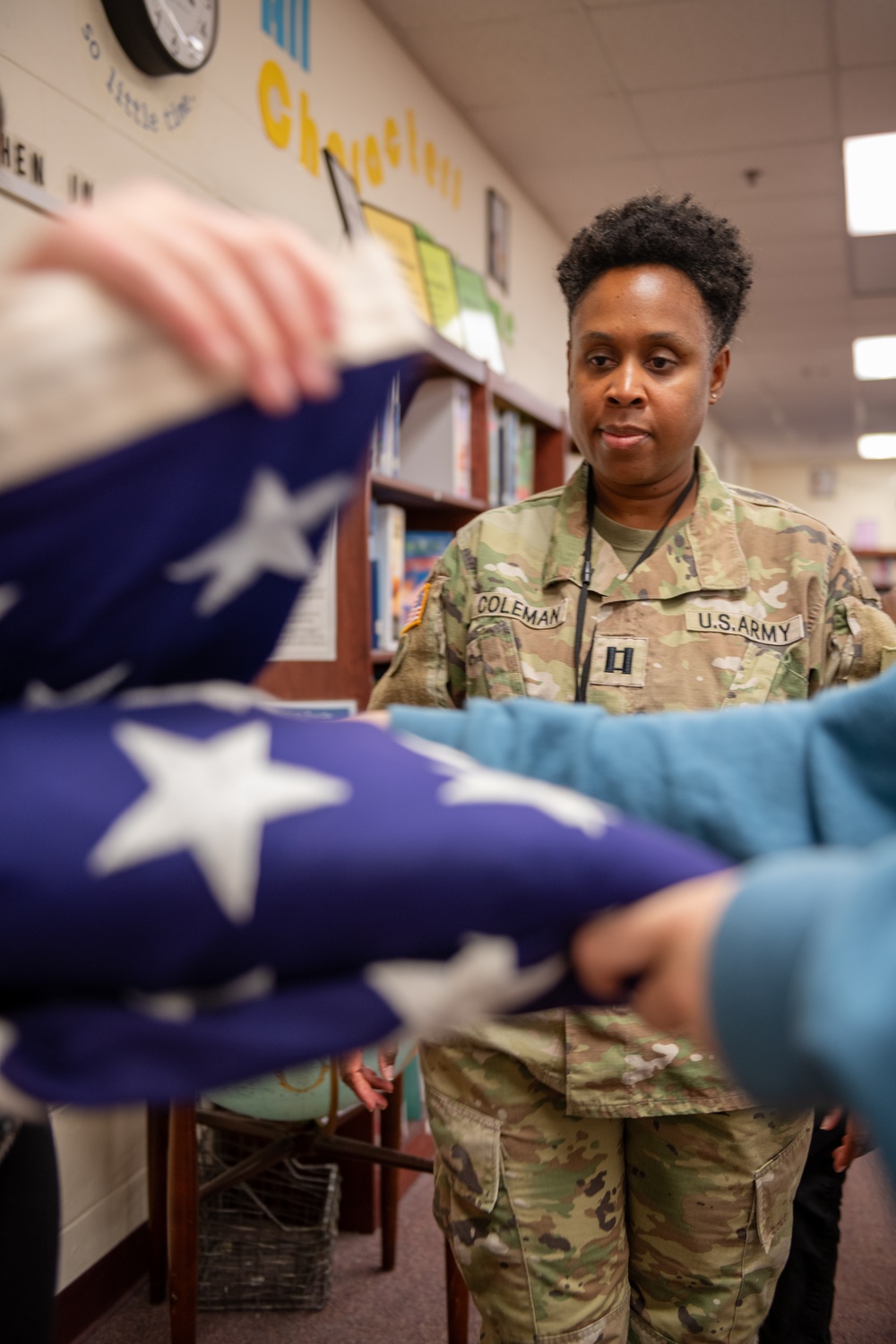 FLARNG Soldier Teaches Young Safety Patrol Students Flag Folding Traditions