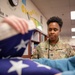 FLARNG Soldier Teaches Young Safety Patrol Students Flag Folding Traditions