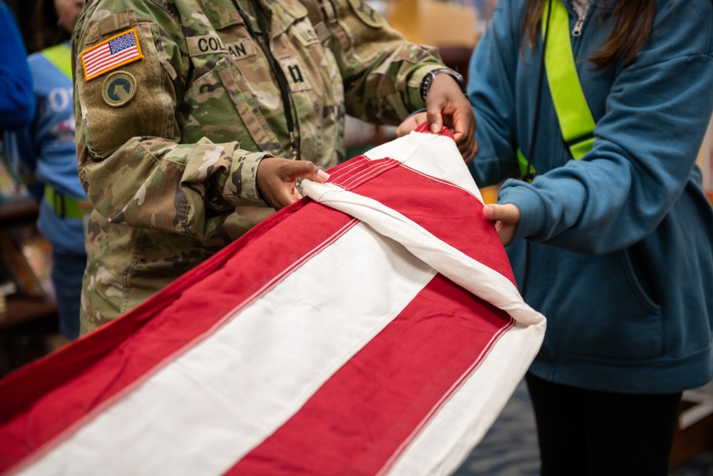 FLARNG Soldier Teaches Young Safety Patrol Students Flag Folding Traditions