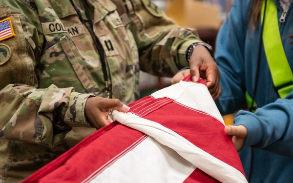 FLARNG Soldier Teaches Young Safety Patrol Students Flag Folding Traditions