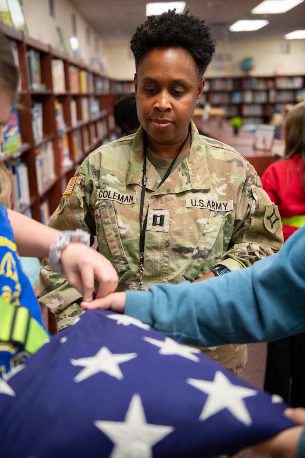 FLARNG Soldier Teaches Young Safety Patrol Students Flag Folding Traditions