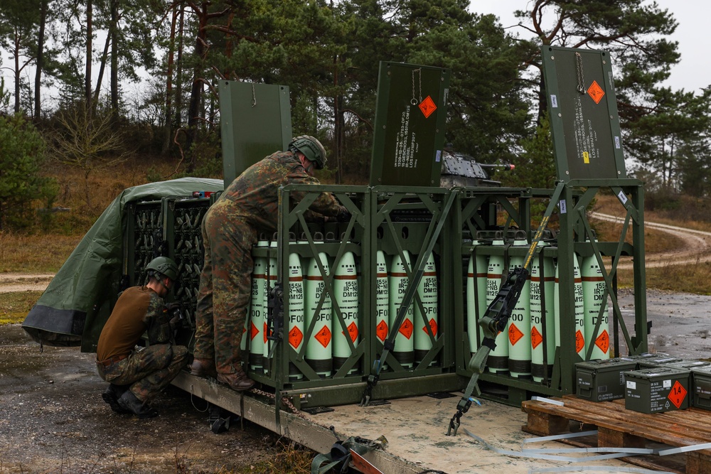 German Army prepares artillery rounds for live fire exercise during Dynamic Front 25