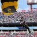 Members of the U.S. Army Parachute Team perform a demonstration jump into Nissan Stadium Sunday, November 17th, 2024.