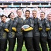 Members of the U.S. Army Parachute Team perform a demonstration jump into Nissan Stadium Sunday, November 17th, 2024.