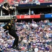 Members of the U.S. Army Parachute Team perform a demonstration jump into Nissan Stadium Sunday, November 17th, 2024.