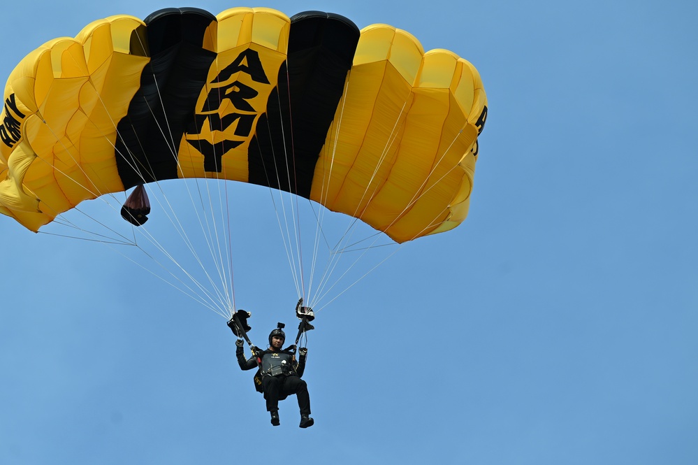 Members of the U.S. Army Parachute Team perform a demonstration jump into Nissan Stadium Sunday, November 17th, 2024.