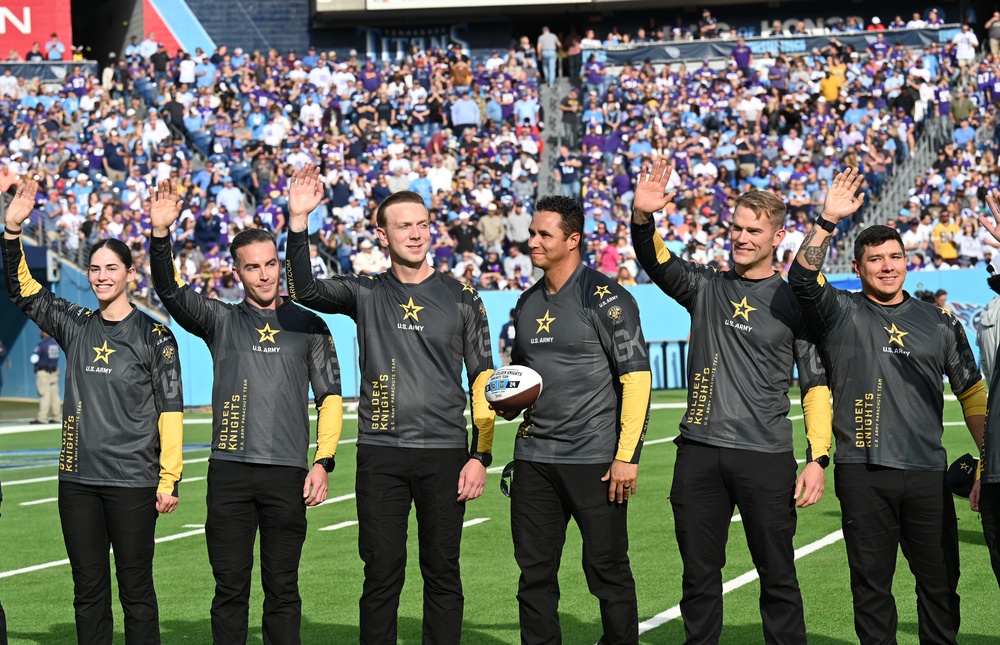 Members of the U.S. Army Parachute Team perform a demonstration jump into Nissan Stadium Sunday, November 17th, 2024.