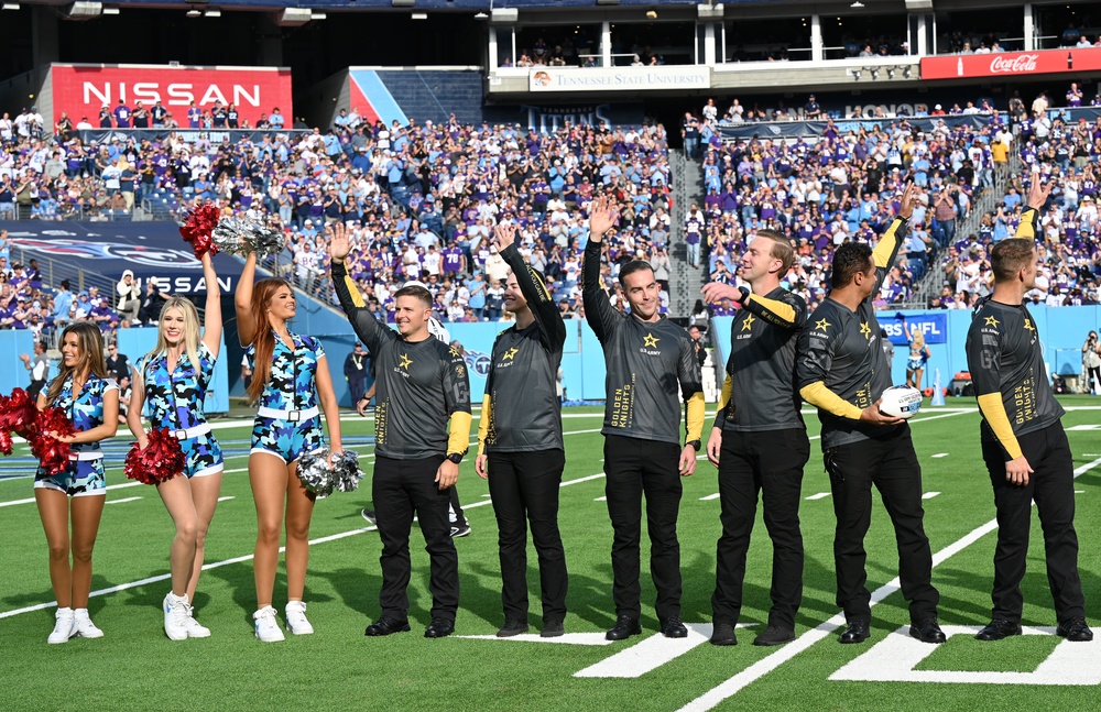 Members of the U.S. Army Parachute Team perform a demonstration jump into Nissan Stadium Sunday, November 17th, 2024.