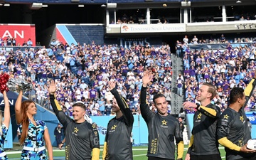 Members of the U.S. Army Parachute Team perform a demonstration jump into Nissan Stadium Sunday, November 17th, 2024.