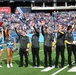 Members of the U.S. Army Parachute Team perform a demonstration jump into Nissan Stadium Sunday, November 17th, 2024.