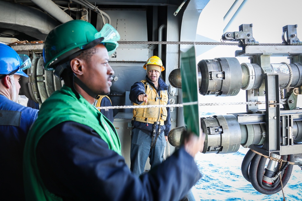 USS Tripoli Conducts Replenishment-at-Sea