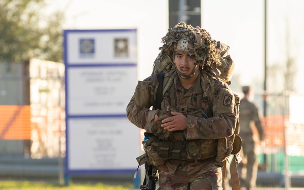 Soldiers conduct 12-mile ruck march for Expert Infantry Badge