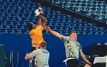 Service members participate in flag football scrimmage hosted by Indianapolis Colts