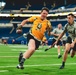 Service members participate in flag football scrimmage hosted by Indianapolis Colts