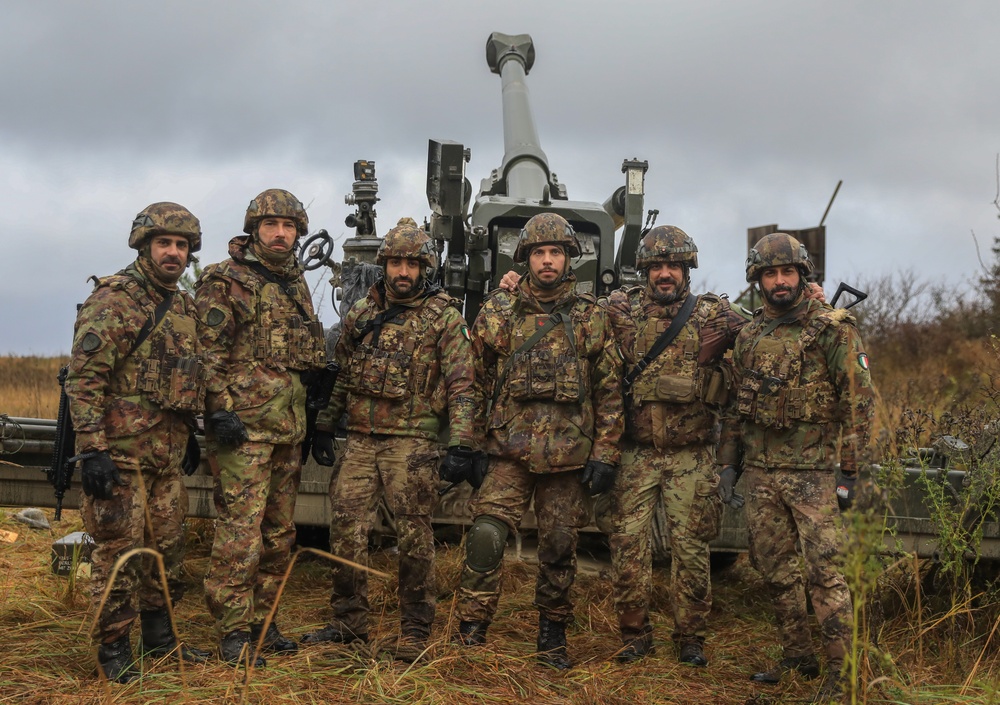 Italian soldiers conduct FH70 live fire exercise as part of the Dynamic Front 25