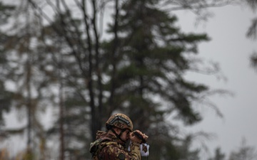 Multinational joint terminal attack controllers execute a close air support mission as part of Dynamic Front 25