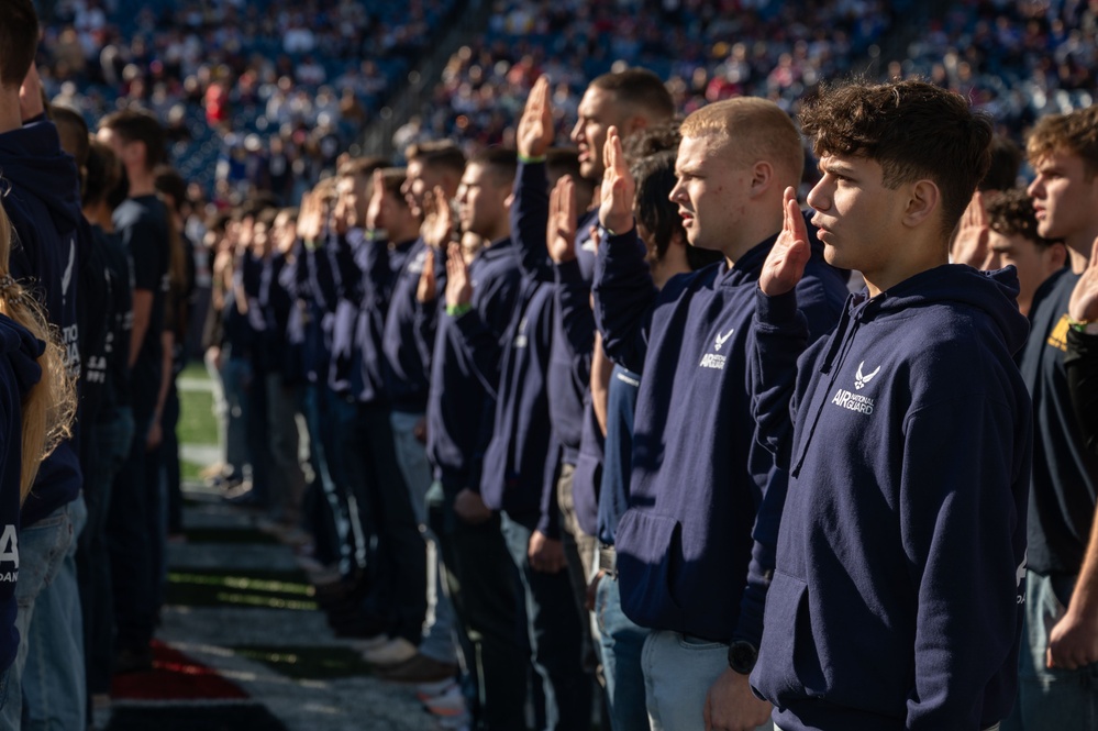 Enlistees swear into the Massachusetts National Guard during New England Patriots Salute to Service Game