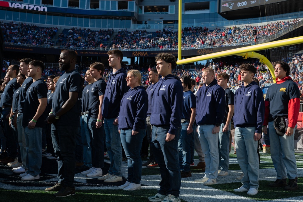 Enlistees swear into the Massachusetts National Guard during New England Patriots Salute to Service Game