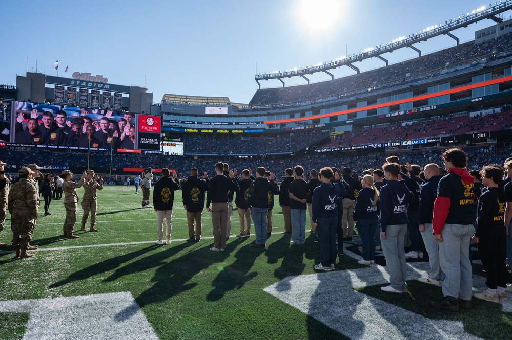 Enlistees swear into the Massachusetts National Guard during New England Patriots Salute to Service Game