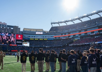 Enlistees swear into the Massachusetts National Guard during New England Patriots Salute to Service Game