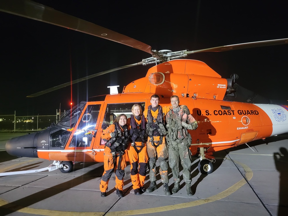 Coast Guard rescues 3 from grounded boat