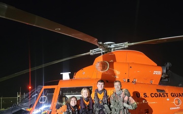 Coast Guard rescues 3 from grounded boat