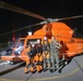 Coast Guard rescues 3 from grounded boat