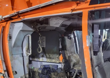 Coast Guard rescues 3 from grounded boat