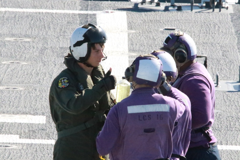 USS Tulsa (LCS 16) Sailors Inspect Fuel Sample