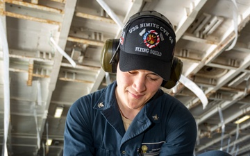 Nimitz Sailor Performs Tests a Ram Fan