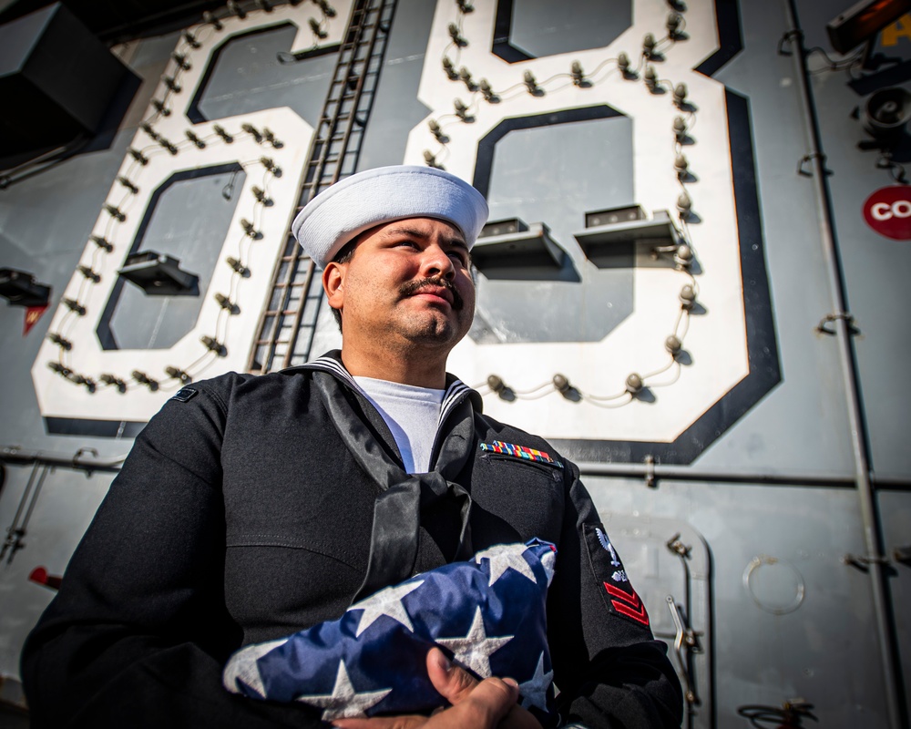 Nimitz Sailor Prepares for Colors