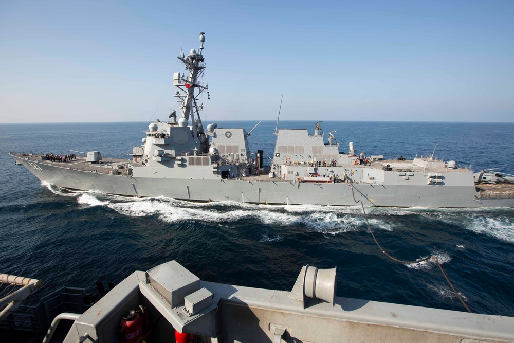 Abraham Lincoln conducts a fueling-at-sea with Frank E. Petersen