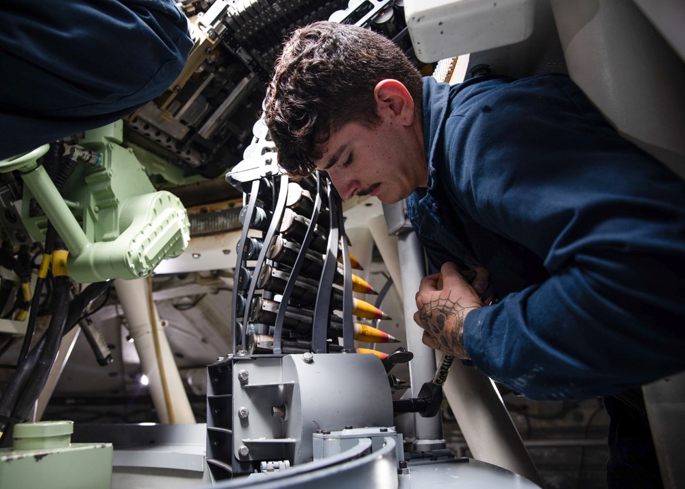 Sailors Assigned to USS Omaha Load an MK 46 30 mm Guns Weapons System