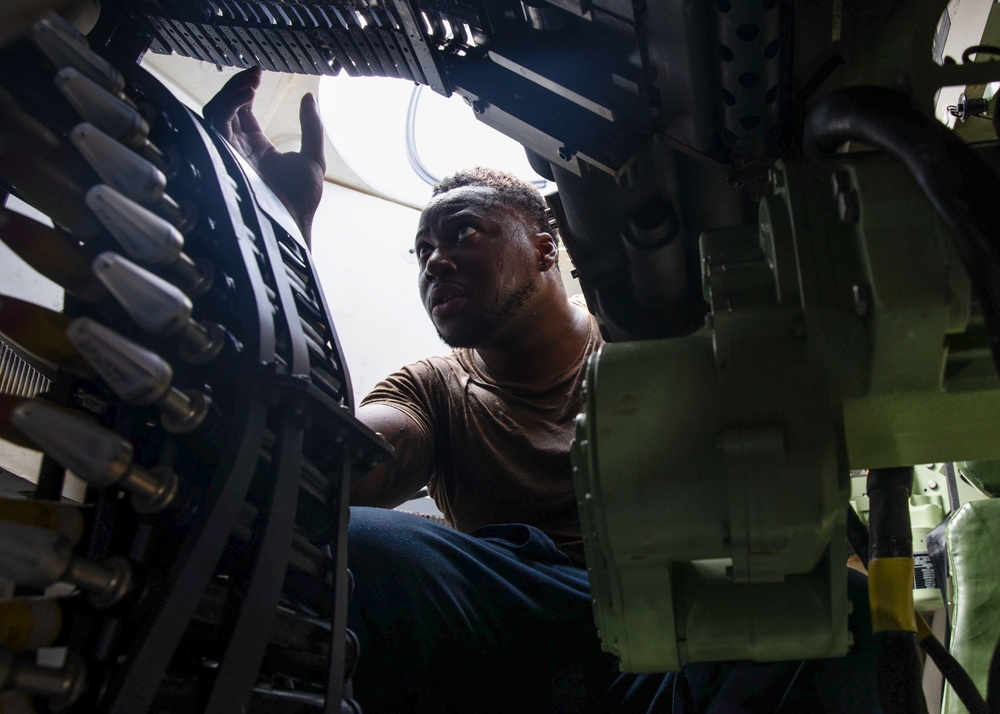 Sailors Assigned to USS Omaha Load an MK 46 30 mm Guns Weapons System