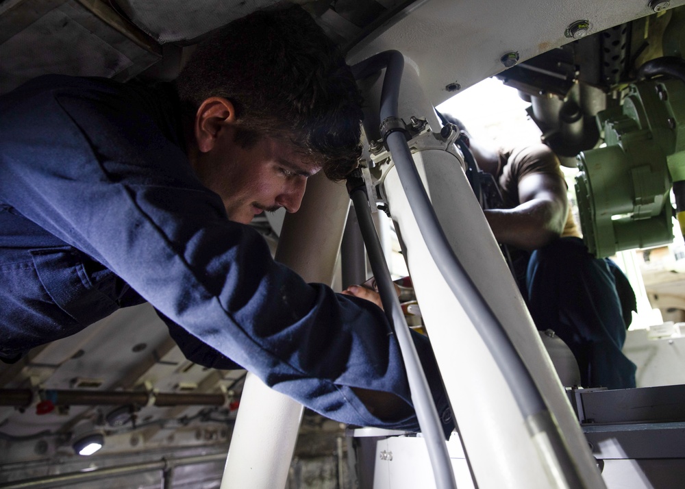 Sailors Assigned to USS Omaha Load an MK 46 30 mm Guns Weapons System