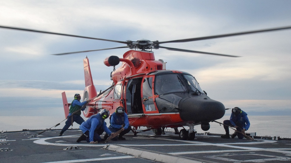 Coast Guard Cutter Seneca and Coast Guard Helicopter Interdiction Tactical Squadron crew members conduct flight operations at sea