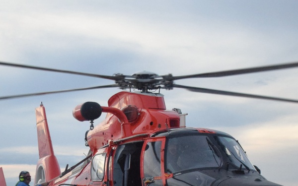 Coast Guard Cutter Seneca and Coast Guard Helicopter Interdiction Tactical Squadron crew members conduct flight operations at sea