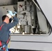 USS Tulsa (LCS 16) Sailor Conducts MK110 Maintenance